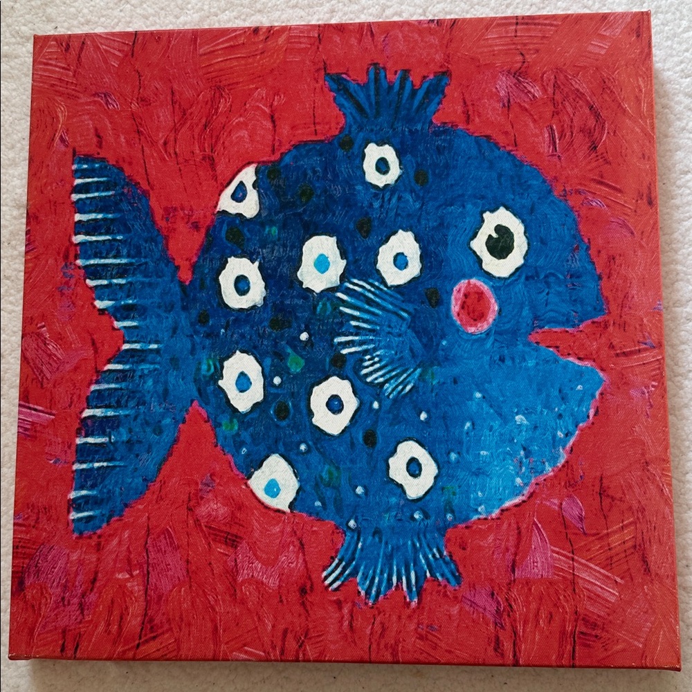 Umbranded Vibrant Colorful Blue Fish in Red Background Canvas Art